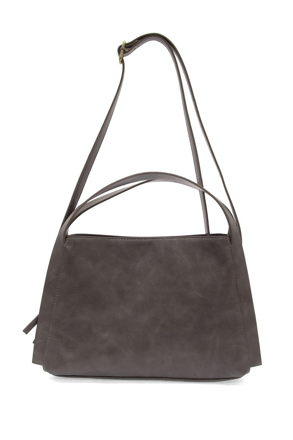 Gray suede crossbody satchel bag with dual carrying straps and structured design
