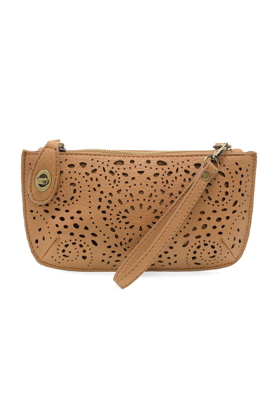 Tan leather laser cut eyelet mini wristlet crossbody clutch with perforated floral pattern