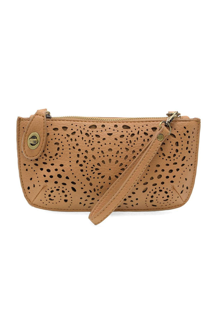 Tan leather laser cut eyelet mini wristlet crossbody clutch with perforated floral pattern