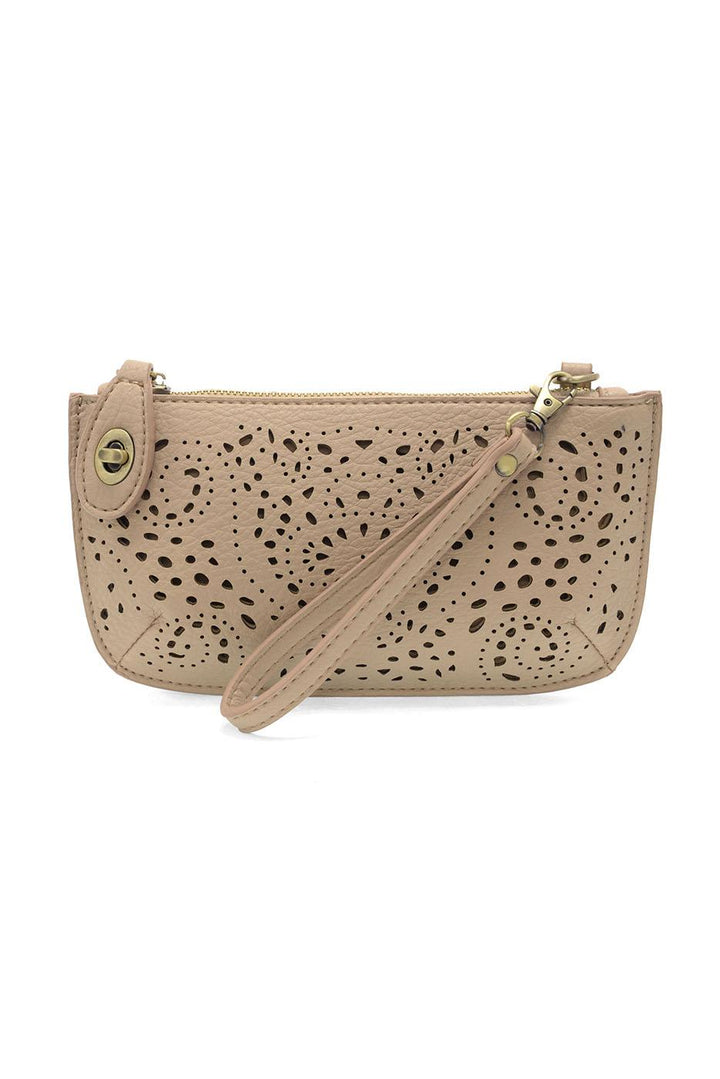 Taupe laser cut eyelet mini wristlet crossbody clutch with perforated pattern and wrist strap