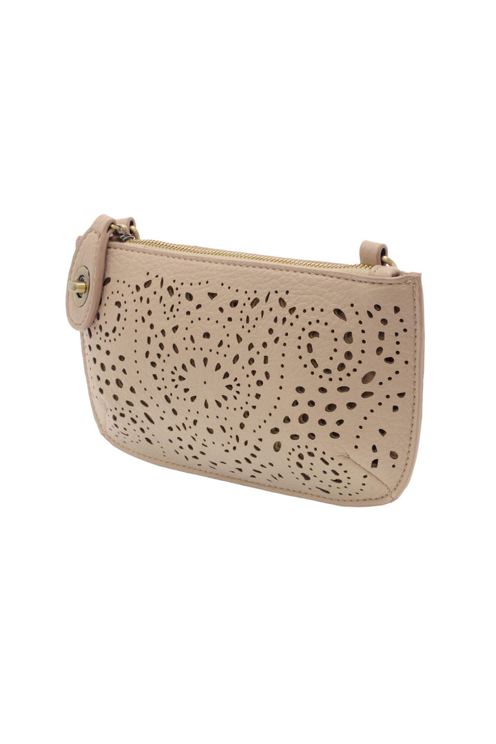 Taupe leather mini crossbody clutch with laser cut eyelet floral pattern and gold zipper