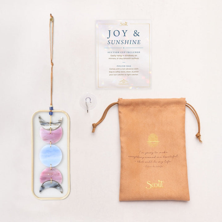 Scout stained glass light catcher with moon phase design in pastels with suction cup