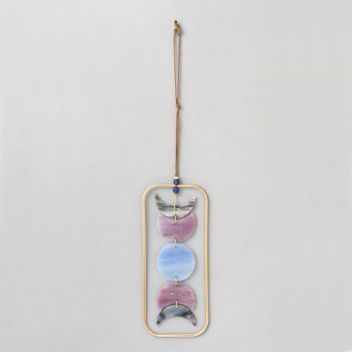Scout Stained Glass Light Catcher featuring moon phases in pink and blue hues