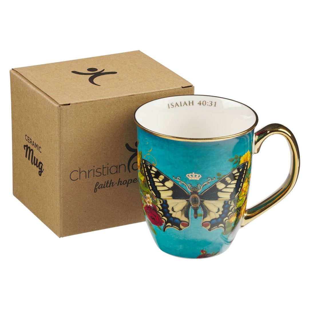 Teal ceramic mug with colorful butterfly design and Isaiah 40:31 scripture verse