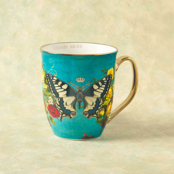 Teal ceramic mug with butterfly design and gold handle, Bible verse Isaiah 40:31