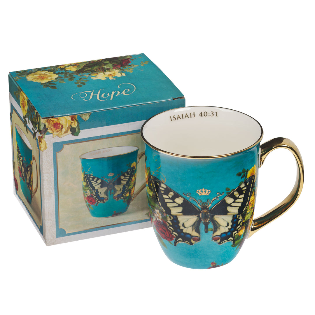 Teal ceramic mug with butterfly design and Isaiah 40:31 scripture in gift box