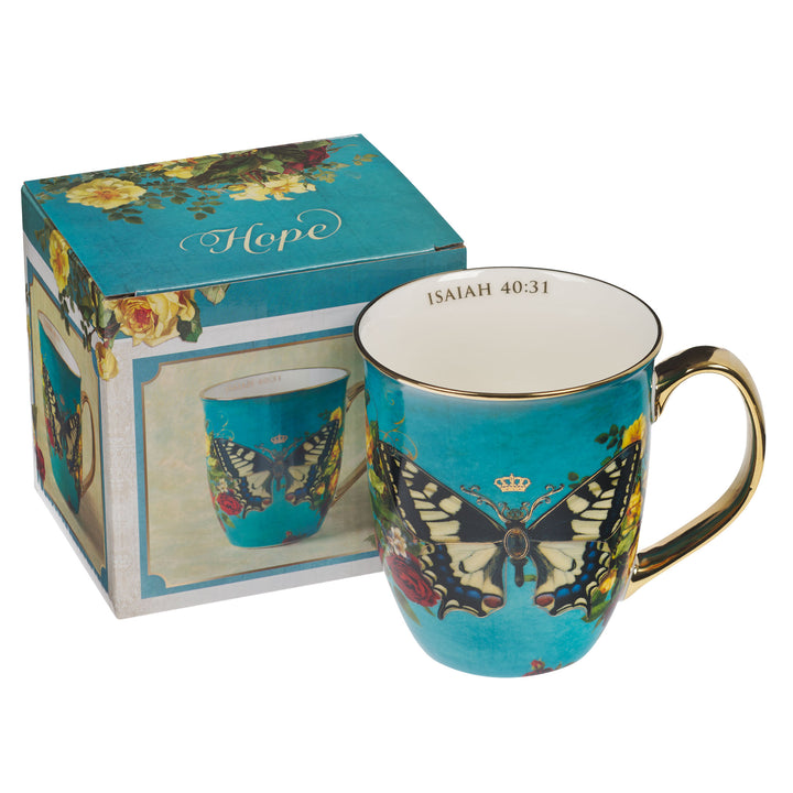 Teal ceramic mug with butterfly design and Isaiah 40:31 scripture in gift box