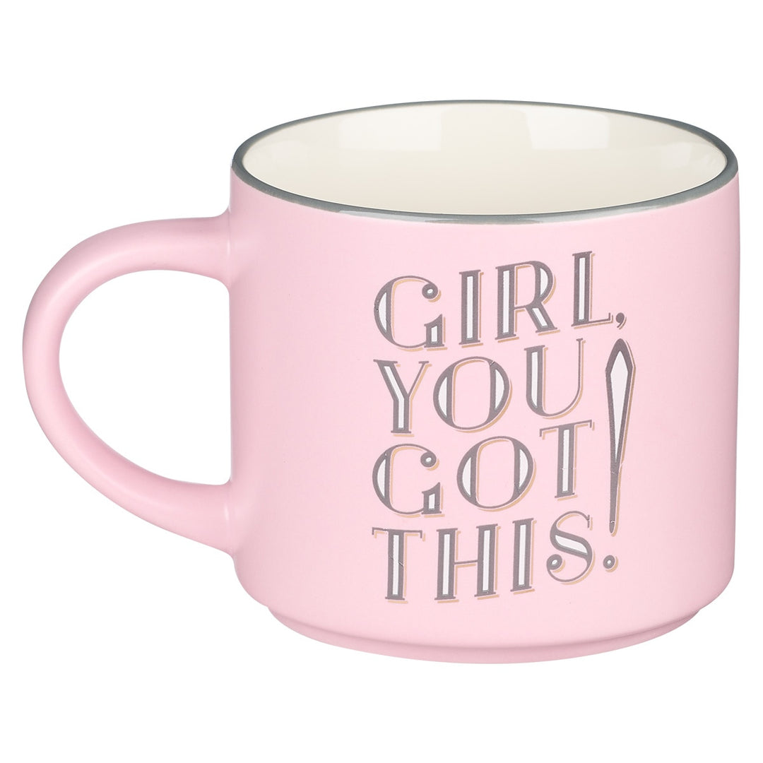 Pink ceramic mug with embossed text 'Girl You Got This' on clean background