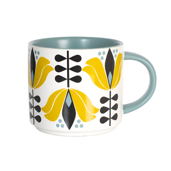 White ceramic mug with yellow flowers and sage green interior and handle