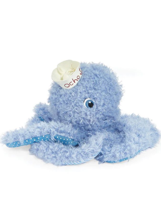 Light blue plush octopus toy with cream flower and polka dot ribbon by Bunnies by the Bay