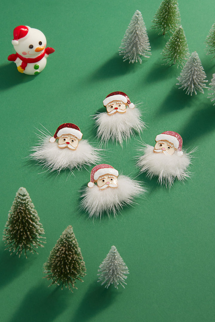 Christmas Santa Claus post earrings with fluffy white beard and red glitter hat displayed on green background