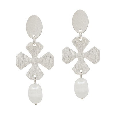 Silver textured cross-shaped drop earrings with white pearl dangles on white background