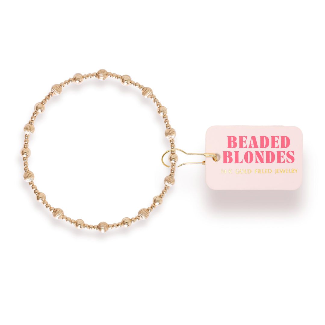 Beaded Blondes Palmer Fluted Bracelet in gold-filled beads with branded tag