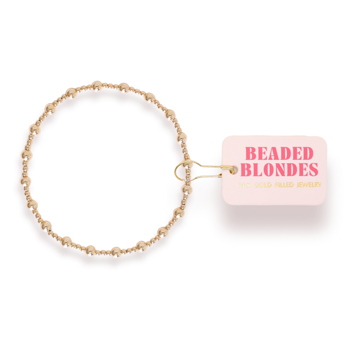 Beaded Blondes Palmer Bracelet in gold-filled beads with brand tag attached