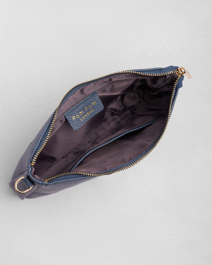 Open Pom Pom London City Slim Bag in slate blue showing interior compartments and zipper