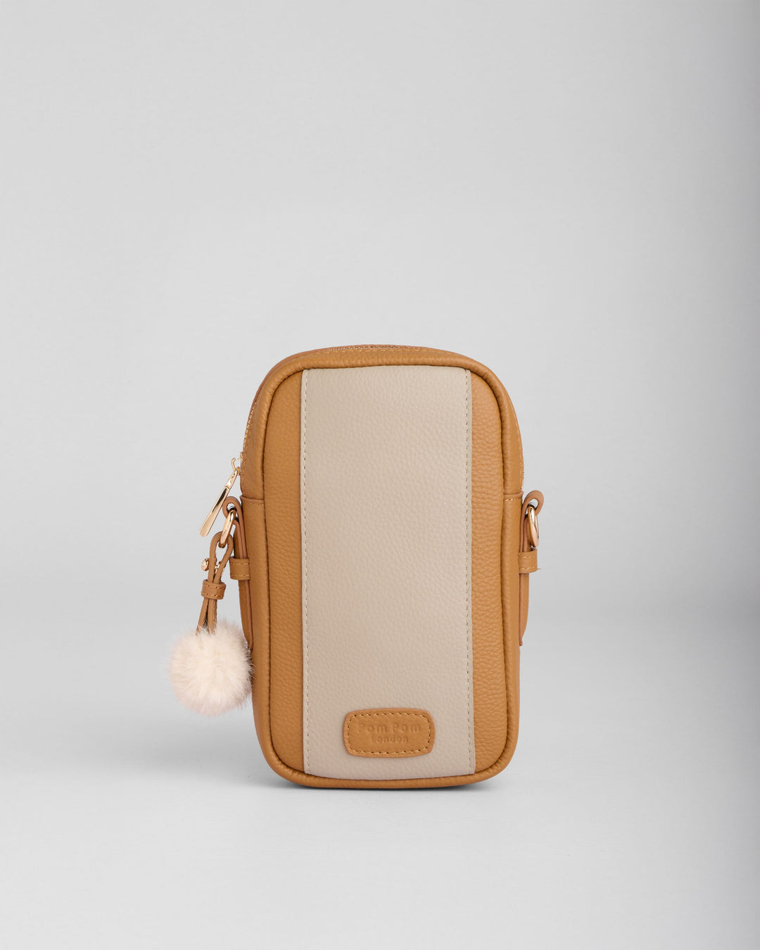Pom Pom London Eaton phone bag in maple brown and stone beige with fluffy charm