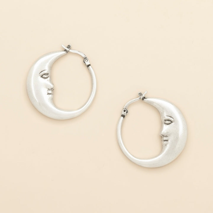 Scout Refined Icon Earrings silver crescent moon hoop earrings with face detail, pair shown
