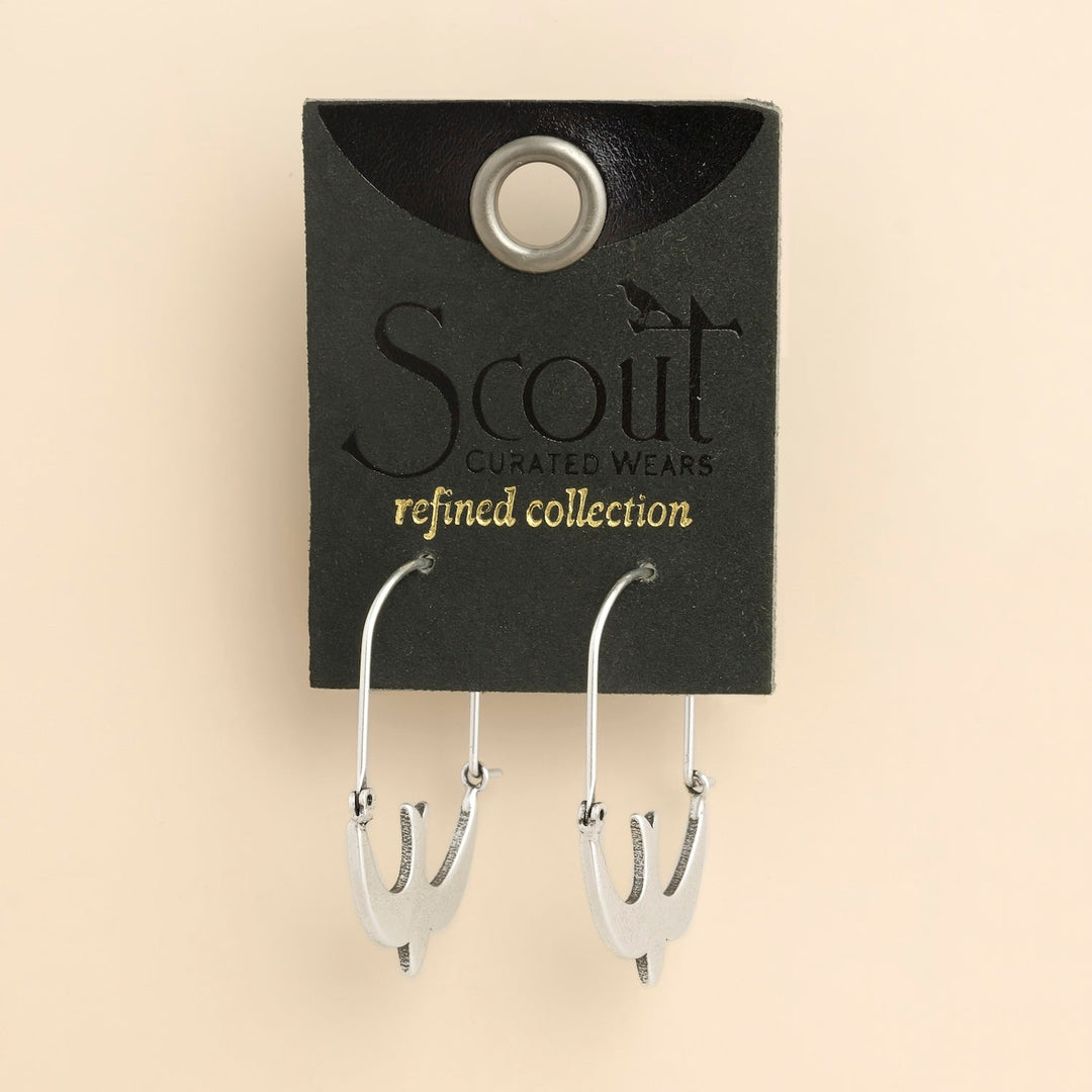 Scout Curated Wears Refined Icon silver swallow hoop earrings on branded display card