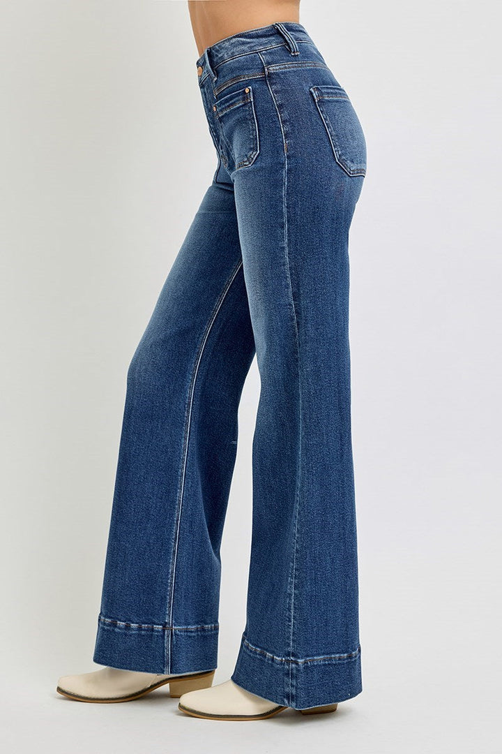 High rise wide flare jeans in medium blue denim with patch pockets and cuffed hems