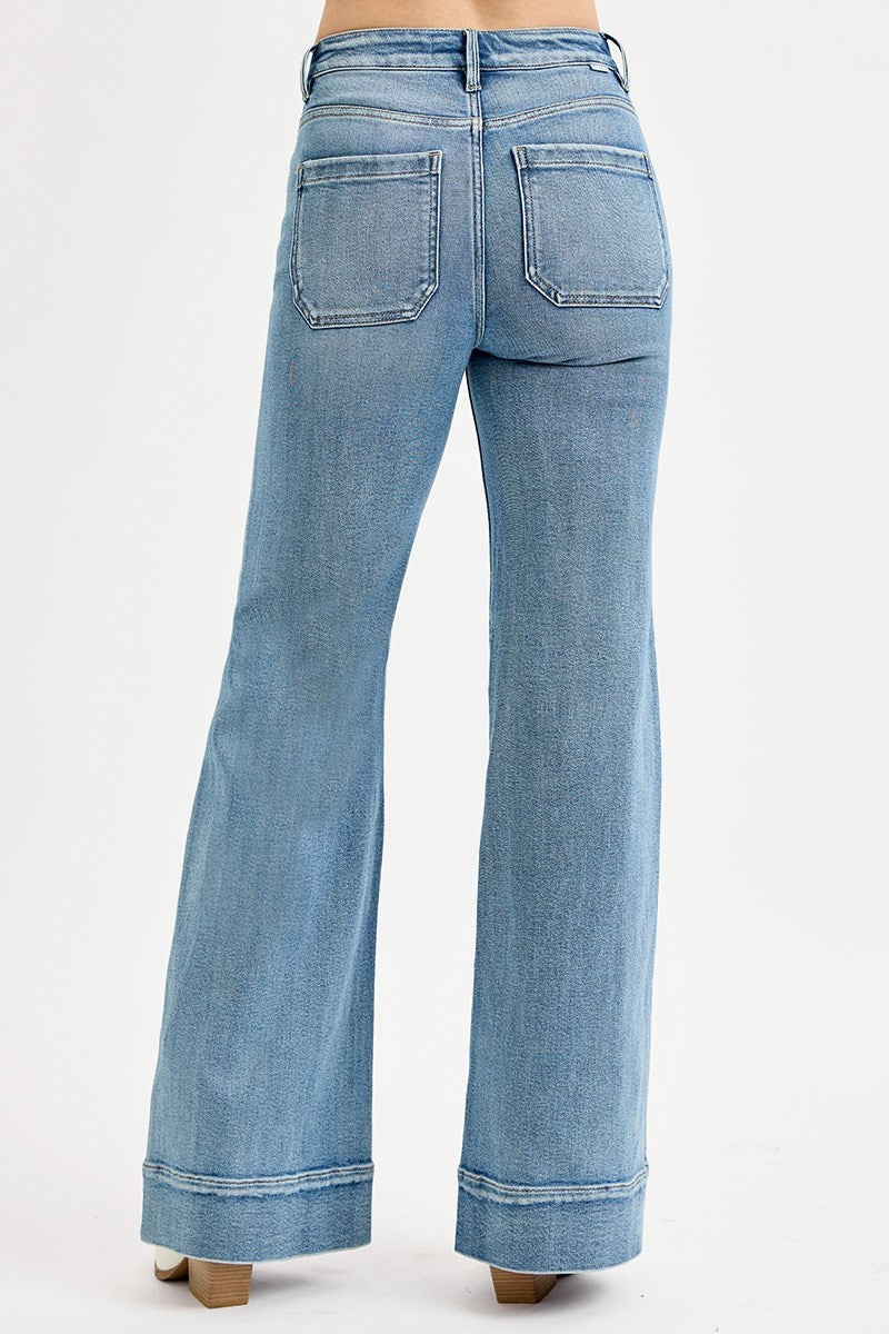 Back view of high rise wide flare jeans in medium blue denim wash