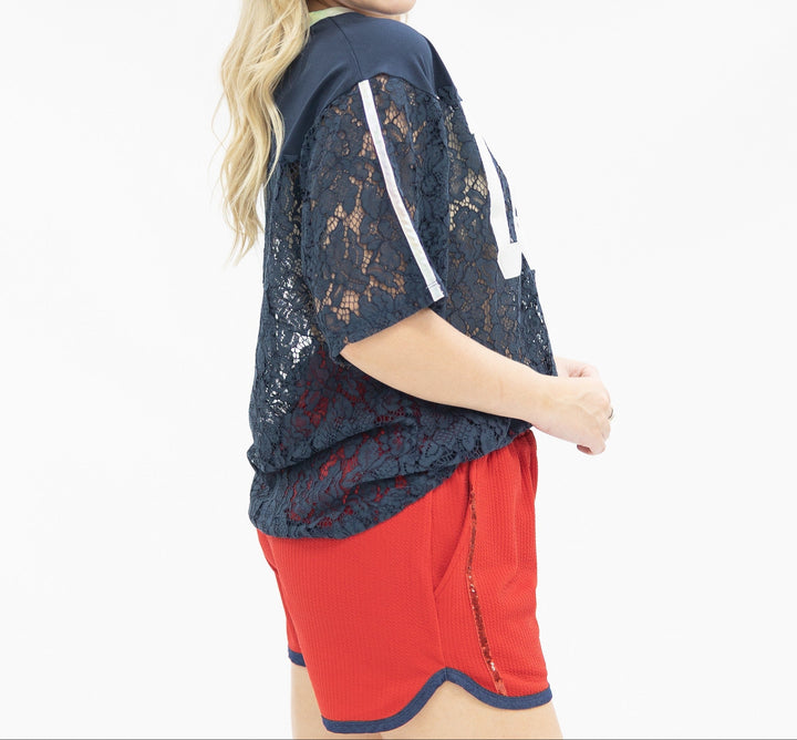 Navy lace jersey top with white USA graphic and red shorts