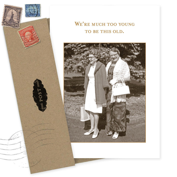 Birthday card with vintage postcard design featuring black and white photo and stamps