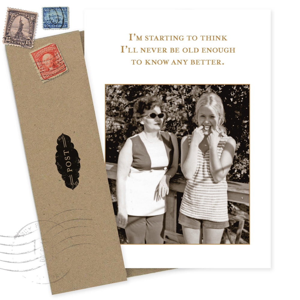 Birthday greeting card with vintage stamps, kraft envelope, and photo of two women laughing
