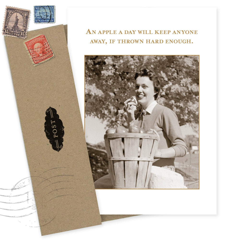 Vintage-style greeting card with sepia photograph, postage stamps, and humorous apple quote