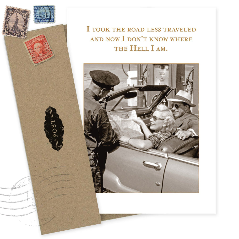 Birthday greeting card with vintage travel theme, stamps, and humorous road less traveled text
