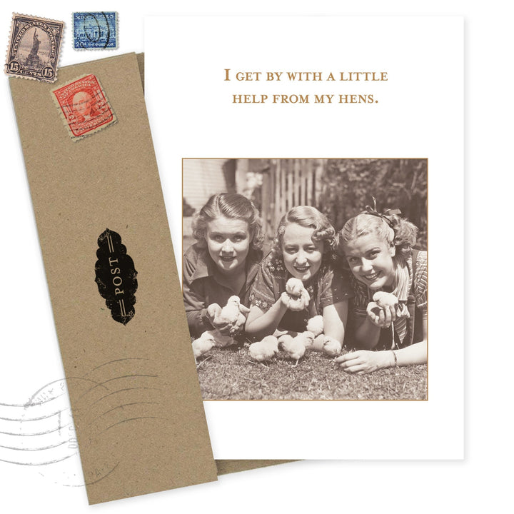 Vintage-style greeting card with three women holding baby chicks, kraft envelope, postage stamps