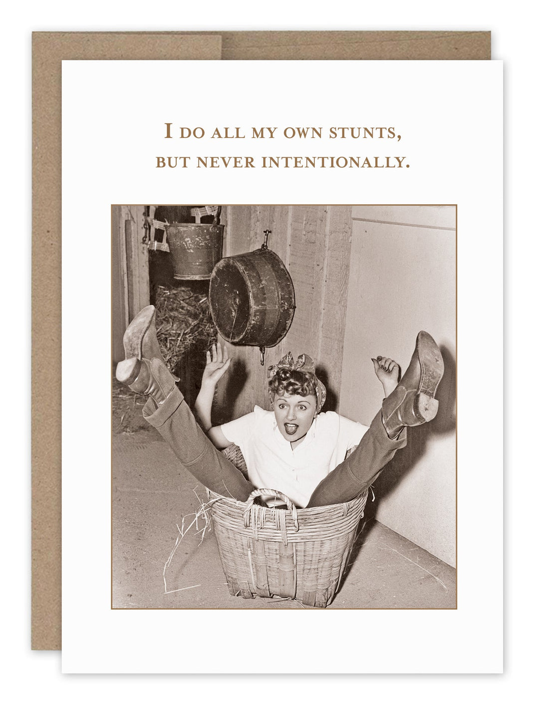 Humorous greeting card featuring vintage woman in basket with text about doing own stunts