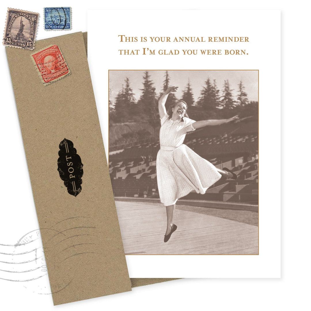 Birthday card with vintage woman dancing and text 'annual reminder that I'm glad you were born'