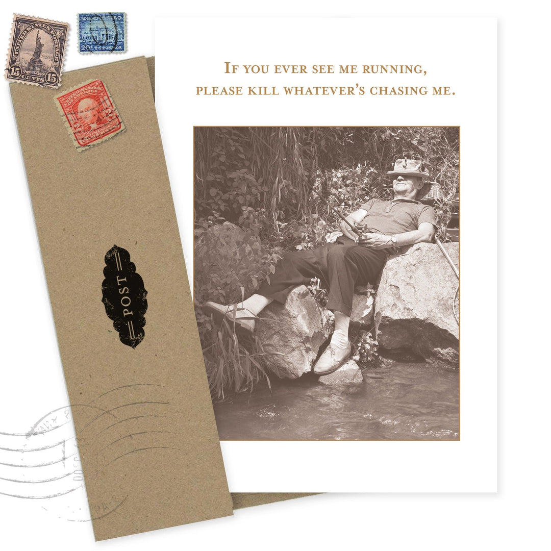 Vintage-style birthday card with humorous text and sepia photo, displayed with postage stamps