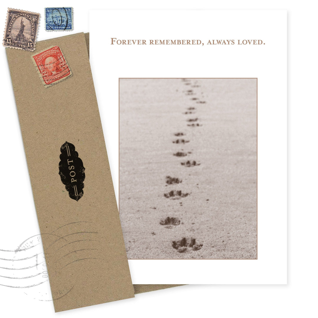 Forever Remembered pet sympathy card with vintage postcard design showing paw prints in sand