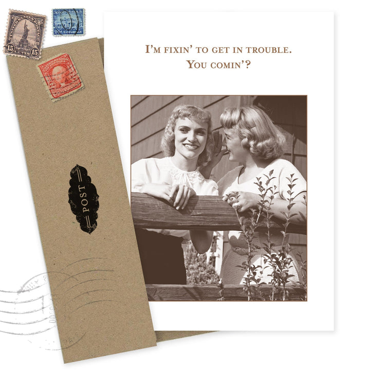 Vintage-style greeting card with stamps and retro photo reading 'I'm fixin' to get in trouble'