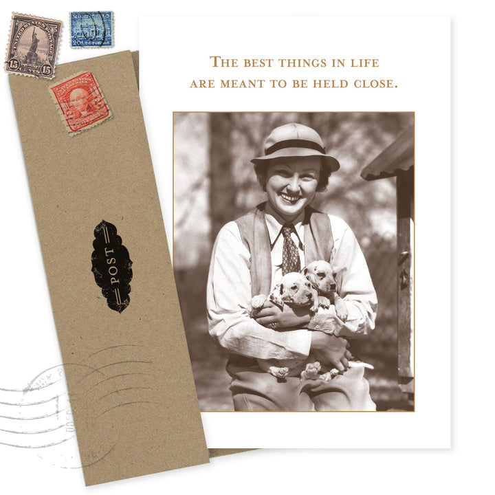 Best Things in Life birthday card featuring vintage woman with puppies and decorative stamps