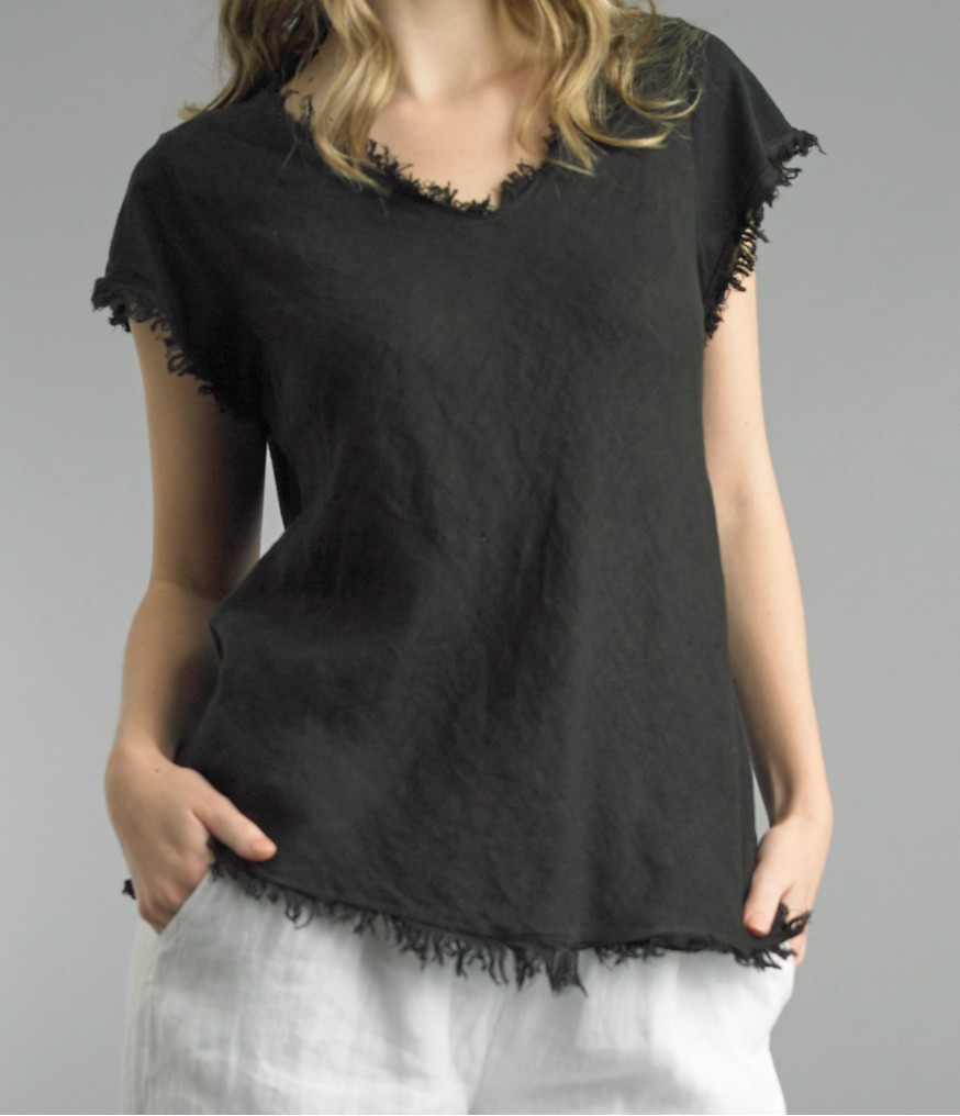 Black frayed edge short sleeve tee with raw hem detailing on model