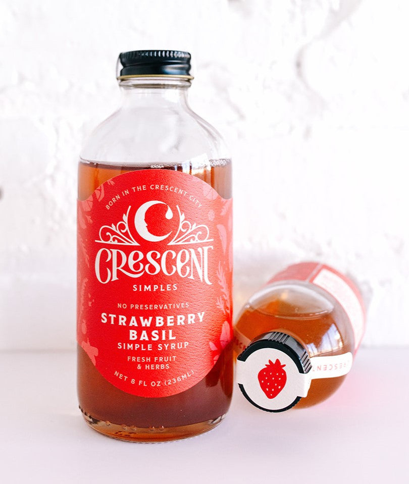 Crescent Simples Strawberry Basil simple syrup bottle with red label and black cap