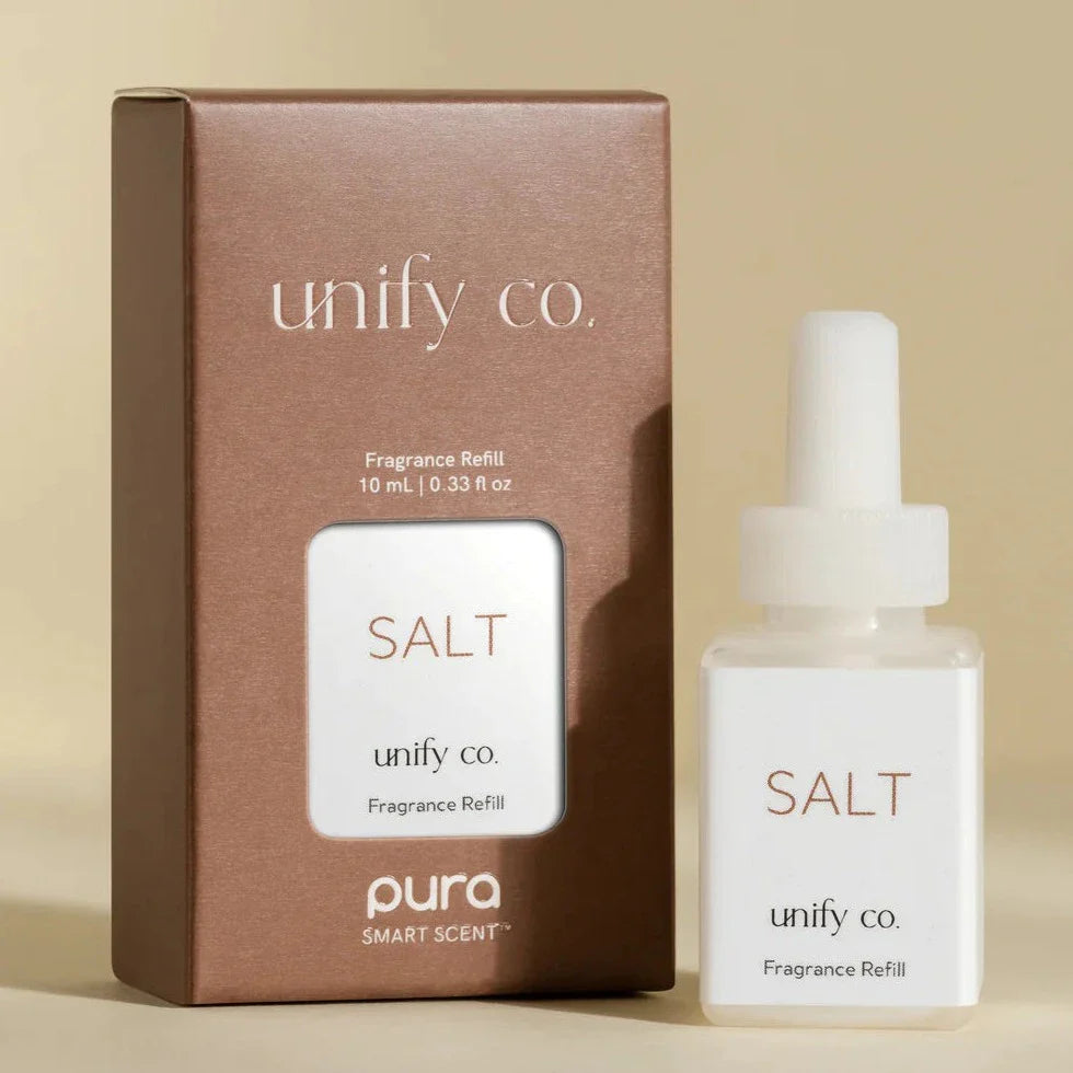 Pura Salt fragrance refill in rose gold packaging with white dropper bottle