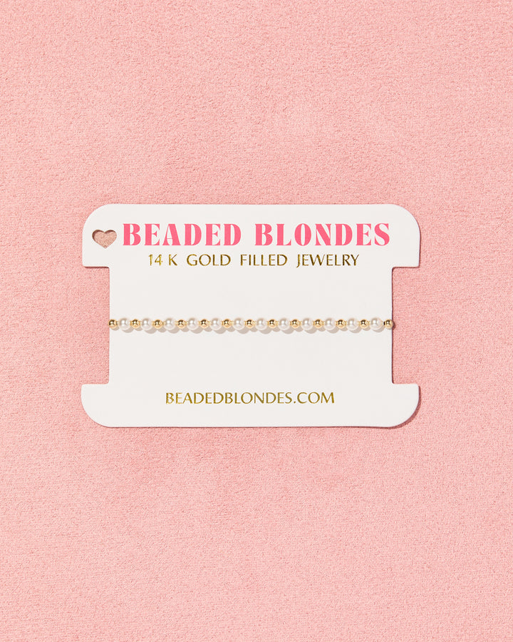 Beaded Blondes Luci Pearl Bracelet in gold on branded jewelry display card