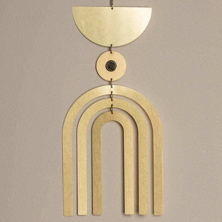 Scout gold metallic wall hanging with geometric rainbow arch and celestial moon phases design