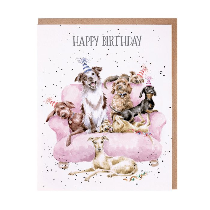 Wrendale Happy Birthday greeting card featuring watercolor dogs on pink couch with party hats