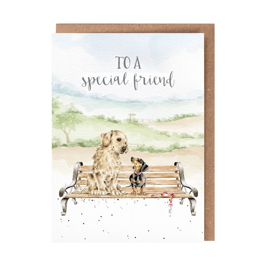 Wrendale greeting card featuring watercolor dogs on bench with 'To a special friend' text