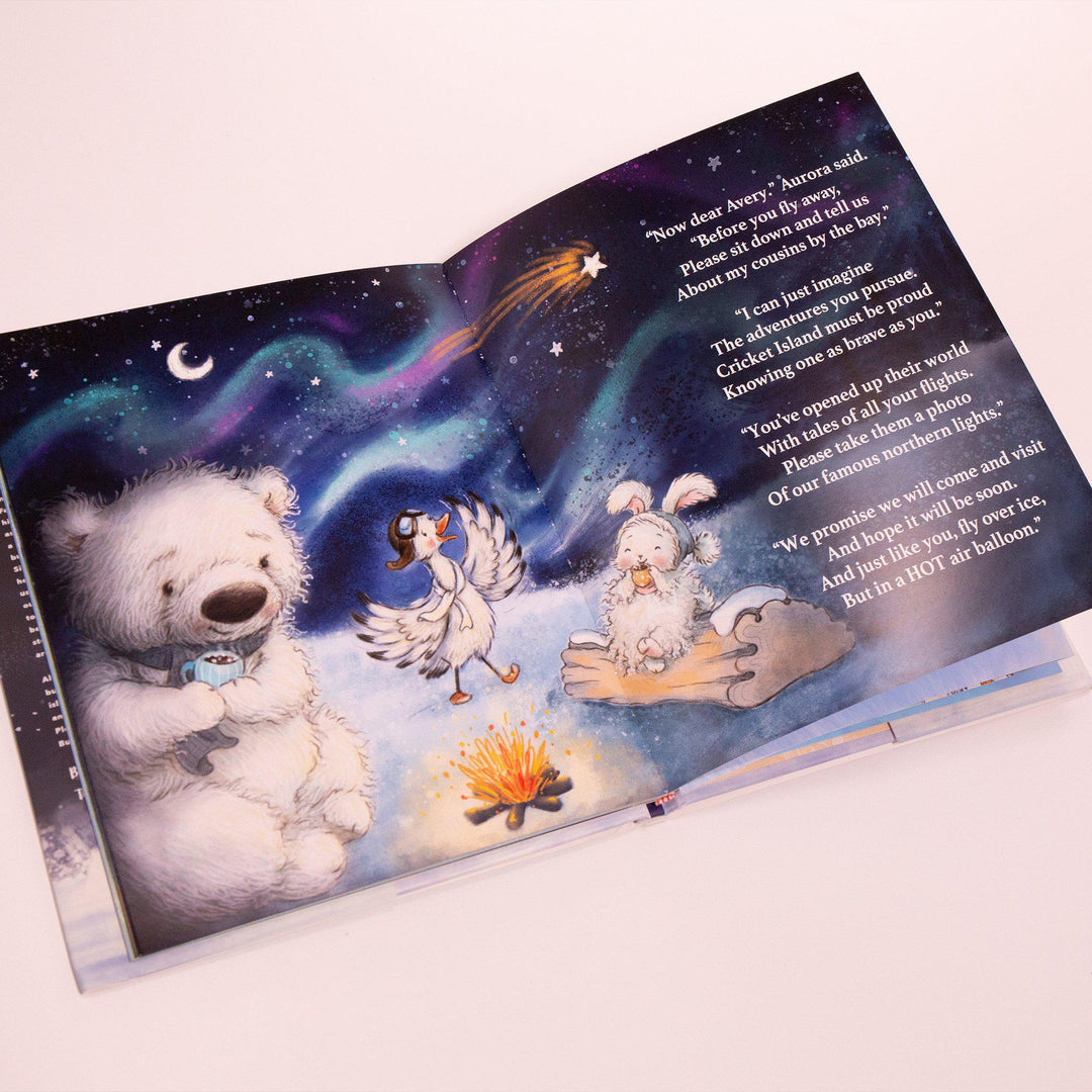 Open spread of Avery the Aviator Braves the Arctic storybook showing polar bear and friends under northern lights