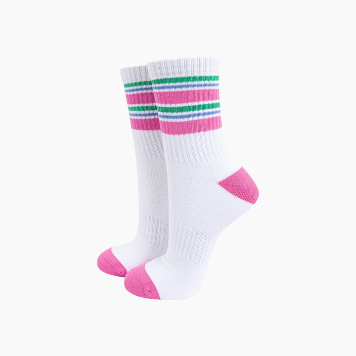 White crew sports socks with pink heel toe and green blue pink stripes