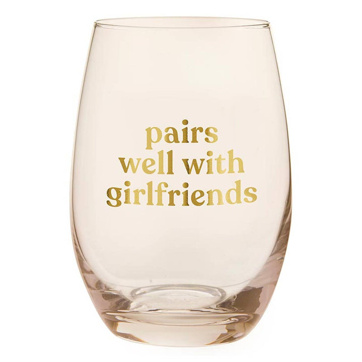 Clear stemless wine glass with gold text reading pairs well with girlfriends