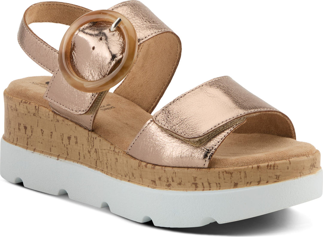 Rose gold metallic platform sandals with cork wedge sole and ankle strap buckle