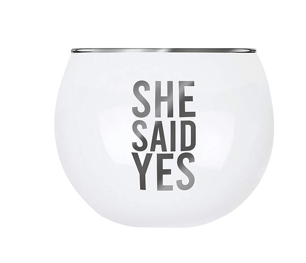 White stemless wine glass with 'SHE SAID YES' text in gray lettering