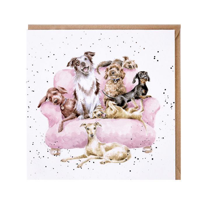 Wrendale greeting card featuring watercolor dogs sitting on pink couch with kraft envelope