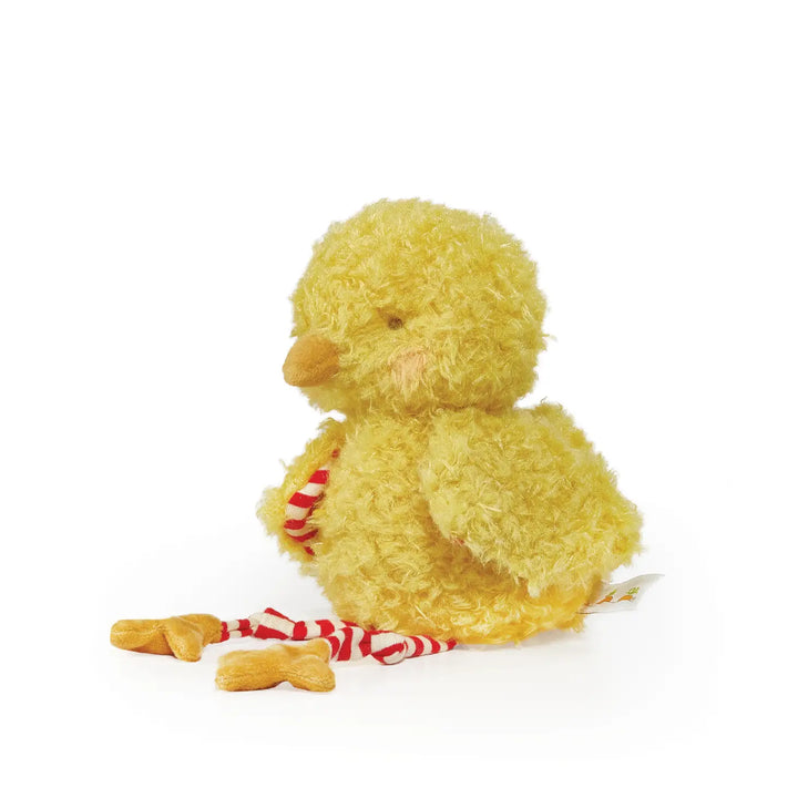Yellow plush toy chicken with red and white striped scarf on white background